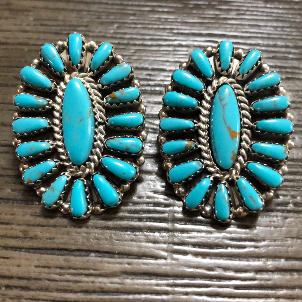 Large turquoise clusters stamped and signed
